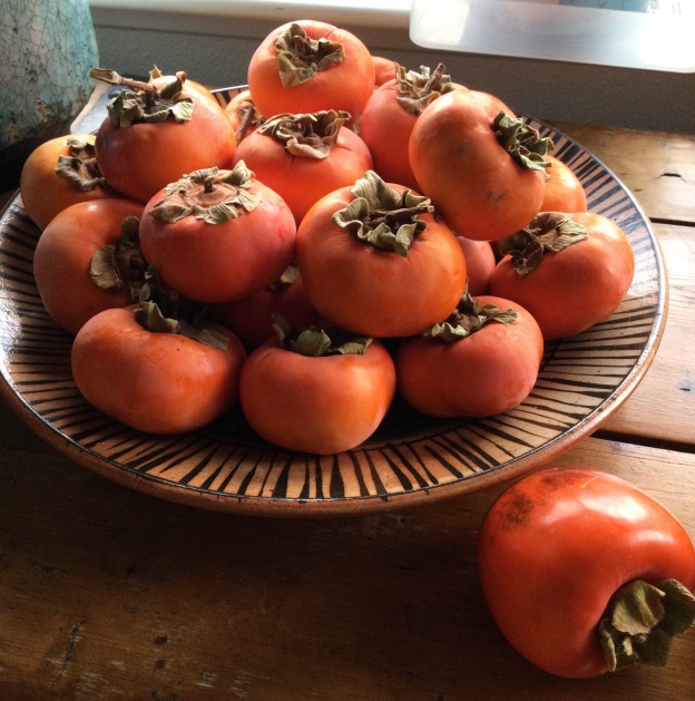 plate of persimmons